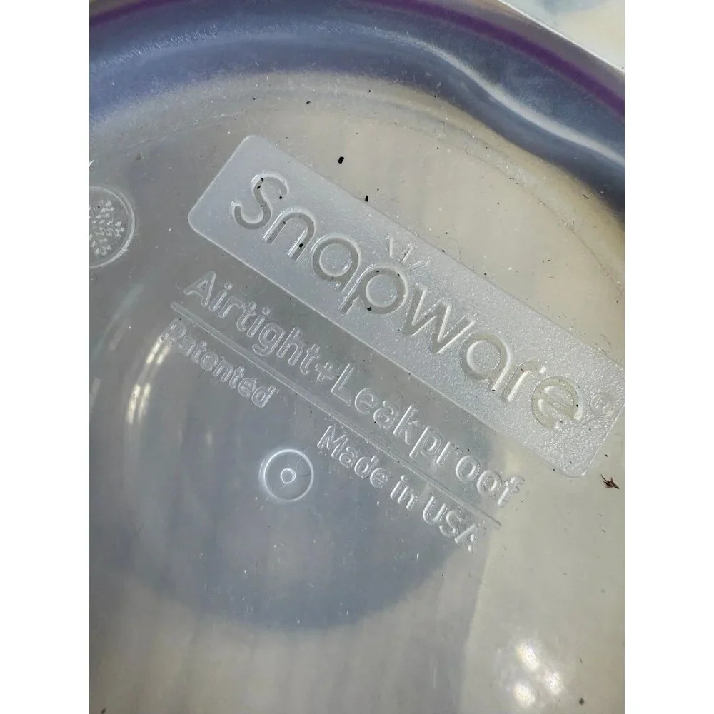 Snapware purple plastic lid with glass ware